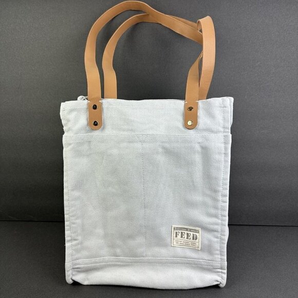 Feed Tote Bag Canvas Glacier Grey Tan Leather Gold Hardware Handbag No Closure - Picture 1 of 12